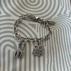James Avery sterling silver bracelet and two retired charms